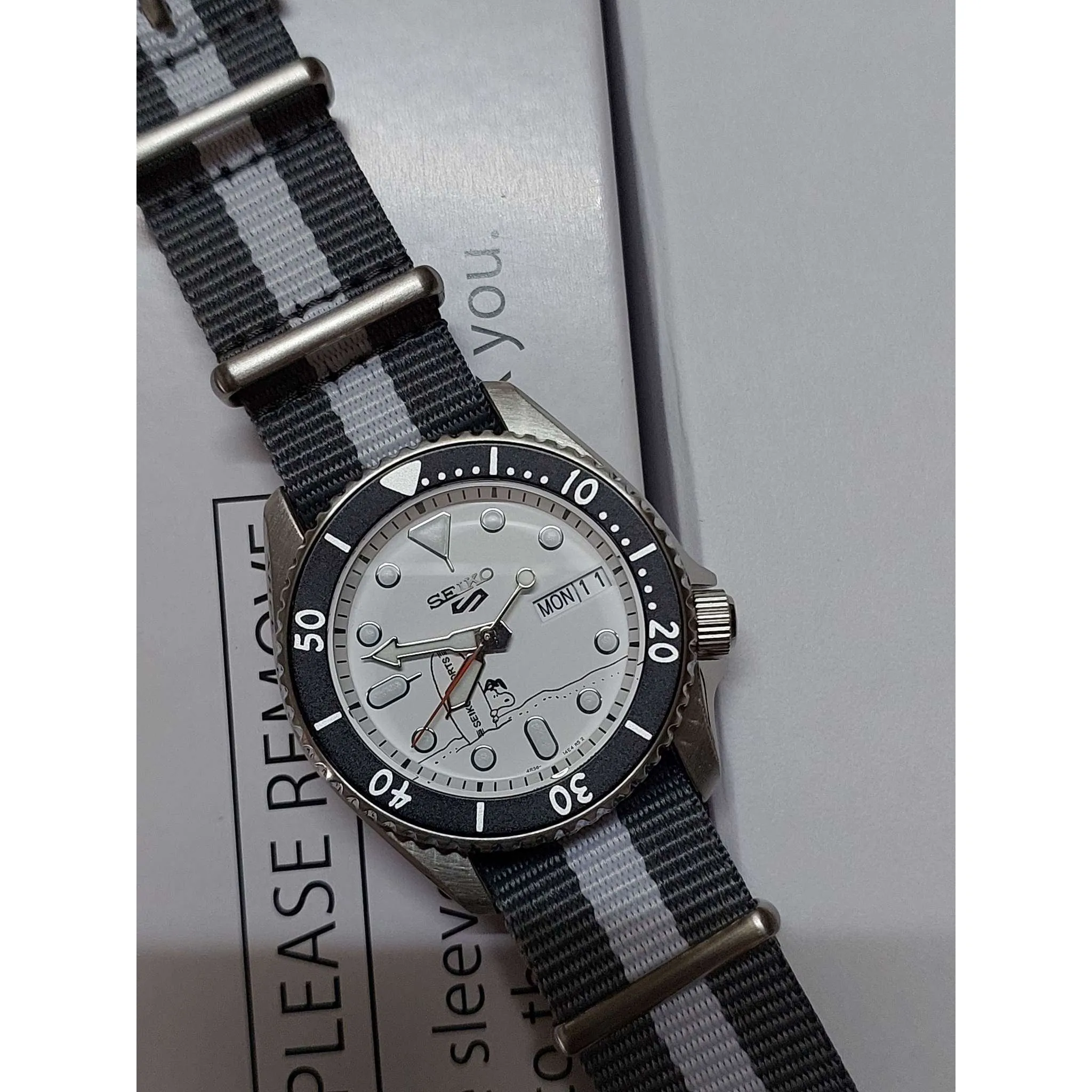 Seiko 5 Sports Snoopy Surf Board Sports Nato Strap Men Watch (8500 LIMITED) SRPK25K1
