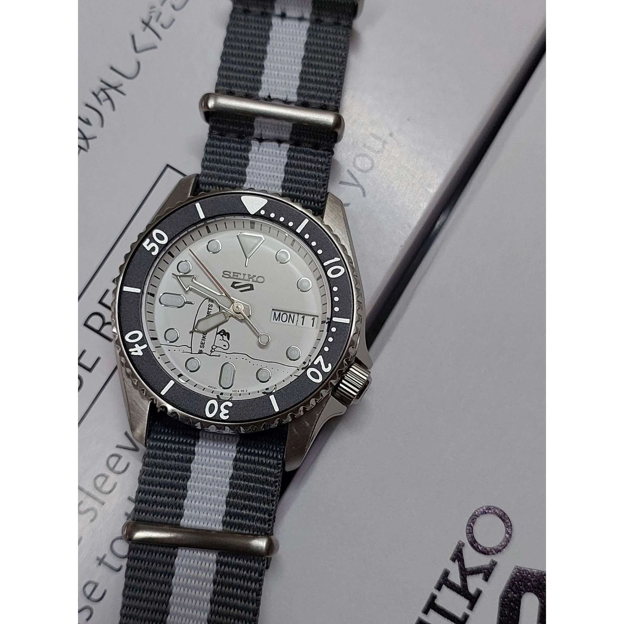 Seiko 5 Sports Snoopy Surf Board Sports Nato Strap Men Watch (8500 LIMITED) SRPK25K1